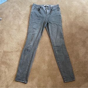 Gray mid rise skinny jeans